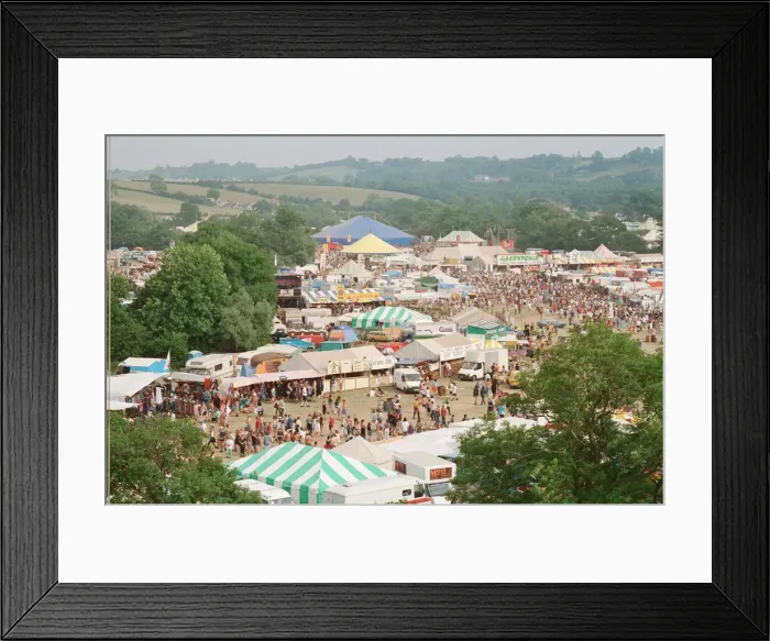 Framed Print : Glastonbury Festival, Worthy Farm, Picton, Somerset. A colourful overview of Framed Print : Glastonbury Festival, Worthy Farm, Picton, Somerset. A colourful overview of