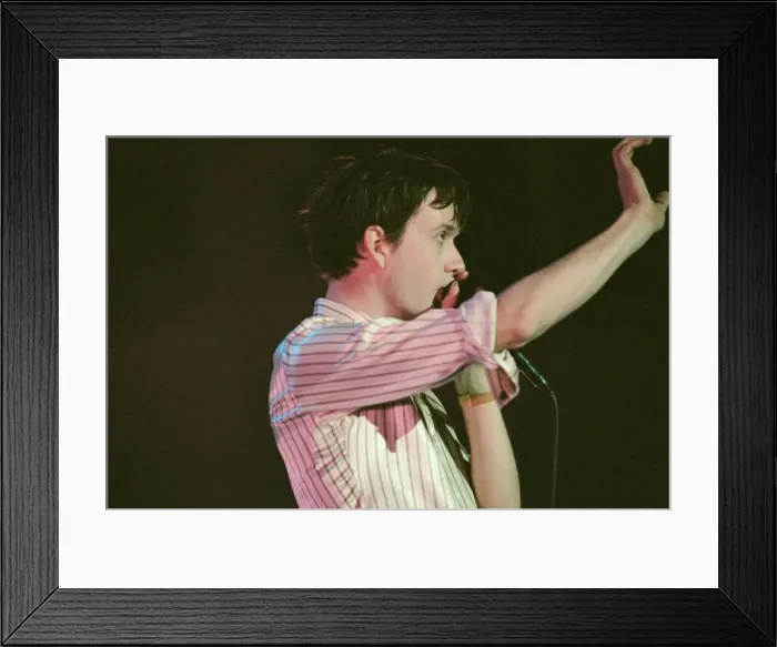 Framed Print : Jarvis Cocker, lead singer with the British band, Pulp, on stage at The Cardiff Framed Print : Jarvis Cocker, lead singer with the British band, Pulp, on stage at The Cardiff