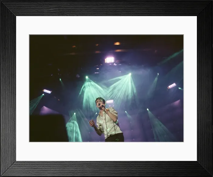 Framed Print : Jarvis Cocker, lead singer with the British band, Pulp, on stage at The Cardiff Framed Print : Jarvis Cocker, lead singer with the British band, Pulp, on stage at The Cardiff