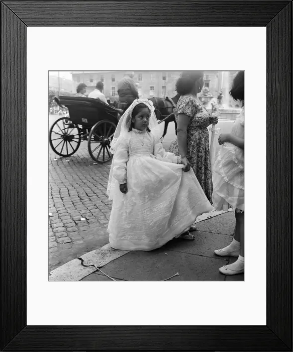 Framed Print : Young child pictured on her way to her First Communion, Rome, Italy Framed Print : Young child pictured on her way to her First Communion, Rome, Italy