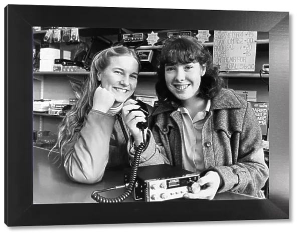 Samantha Bunnell (right) and her friend Jillian Carnell, try out a CB Radio