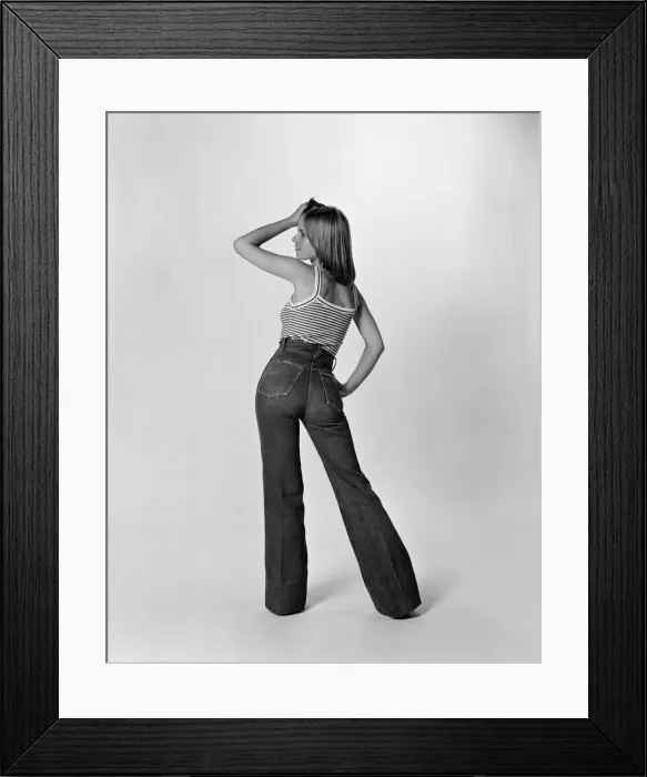 Framed Print : Model wearing Jeans, Studio Pix, Thursday 3rd June 1976 Framed Print : Model wearing Jeans, Studio Pix, Thursday 3rd June 1976