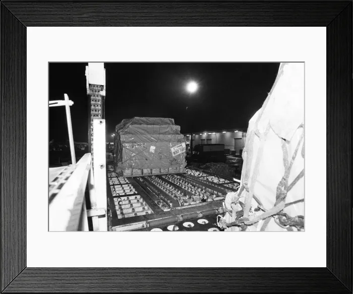 Framed Print : In the early hours of this morning a huge freight plane was loaded up at Gatwick Airport