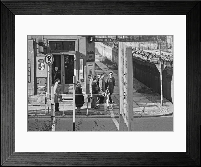 Framed Print : Checkpoint Charlie crossing point in the Berlin Wall located at the junction of Framed Print : Checkpoint Charlie crossing point in the Berlin Wall located at the junction of