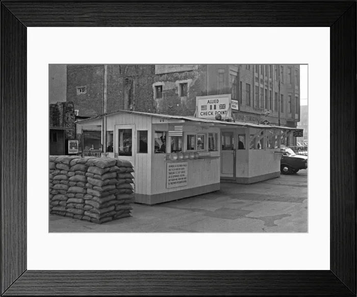 Framed Print : Checkpoint Charlie crossing point in the Berlin Wall located at the junction of Framed Print : Checkpoint Charlie crossing point in the Berlin Wall located at the junction of