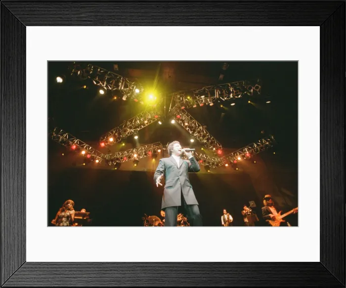 Framed Print : Tom Jones, (singer from Wales) performs at The Cardiff International Arena (The CIA Framed Print : Tom Jones, (singer from Wales) performs at The Cardiff International Arena (The CIA