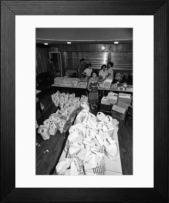 Framed Print : Food parcels being packed and distributed by the miners wives at the Community Hall Framed Print : Food parcels being packed and distributed by the miners wives at the Community Hall