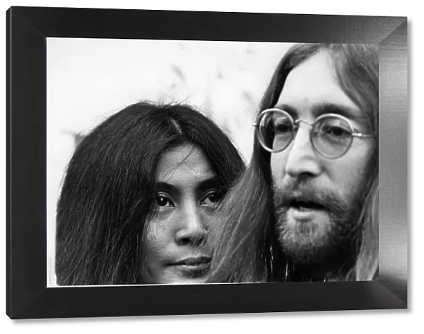 John Lennon and Yoko Ono picture together in The Beatles Apple Office in Savile Row