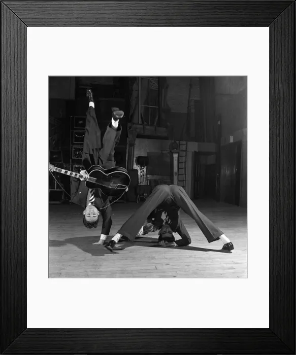 Framed Print : Its just part of their novel dance routine. They are the Nelson Brothers who dance Framed Print : Its just part of their novel dance routine. They are the Nelson Brothers who dance