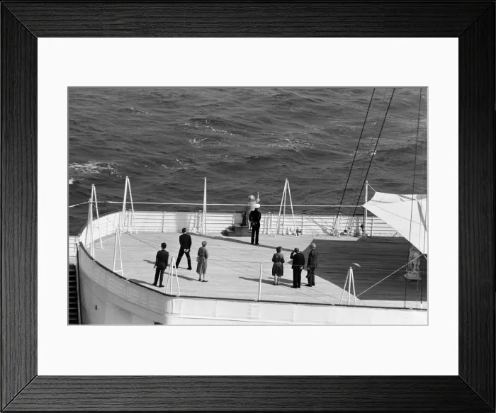 Framed Print : QE2 returns home to Southampton. Union Jacks are festooned on cars, draped on shoulders Framed Print : QE2 returns home to Southampton. Union Jacks are festooned on cars, draped on shoulders