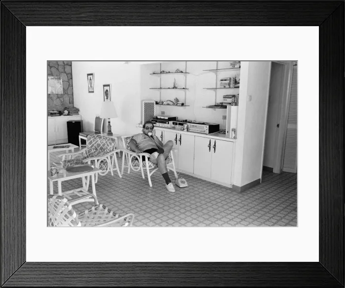 Framed Print : Elton John wearing a Watford F. C. shirt on the Caribbean island of Montserrat Framed Print : Elton John wearing a Watford F. C. shirt on the Caribbean island of Montserrat