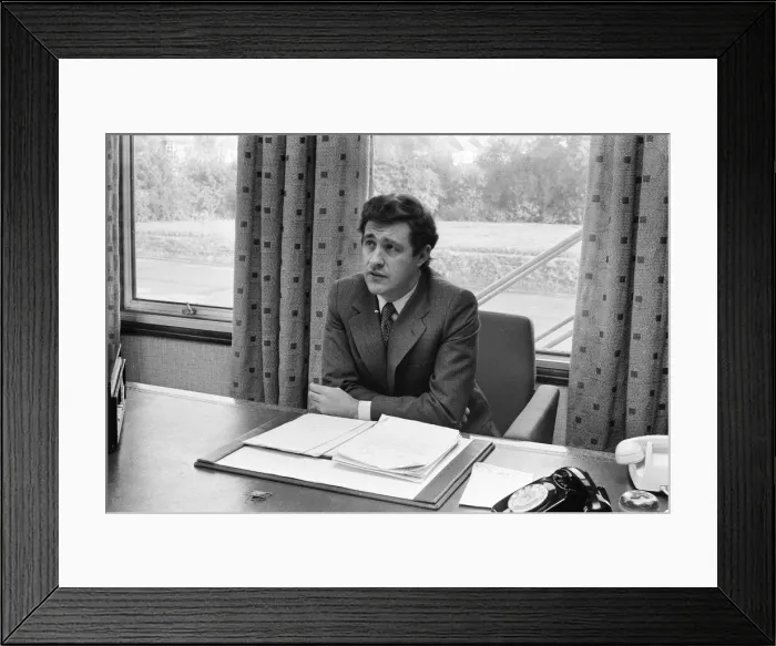 Framed Print : Geoffrey Robinson, Managing Director Jaguar Cars, pictured at his desk, Coventry