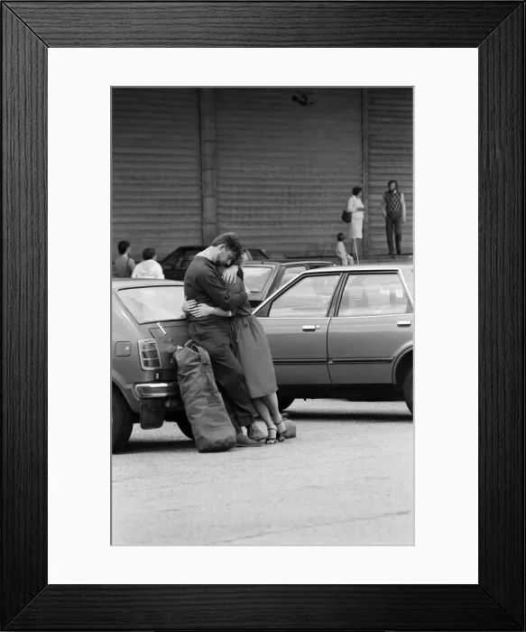 Framed Print : QE2 returns home to Southampton. Union Jacks are festooned on cars, draped on shoulders Framed Print : QE2 returns home to Southampton. Union Jacks are festooned on cars, draped on shoulders