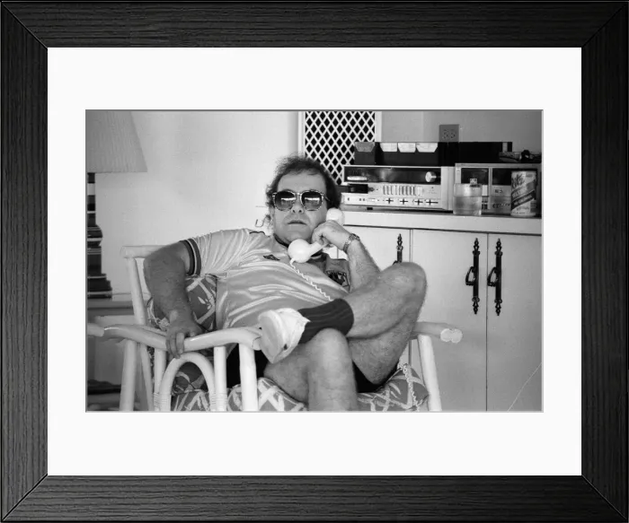 Framed Print : Elton John wearing a Watford F. C. shirt on the Caribbean island of Montserrat