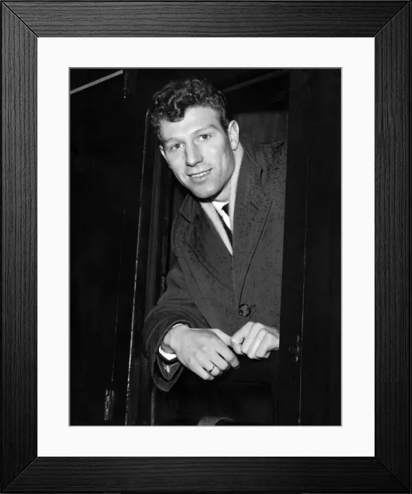 Framed Print : Footballer Colin Grainger aboard the train at Sheffield Station. 4th February 1957