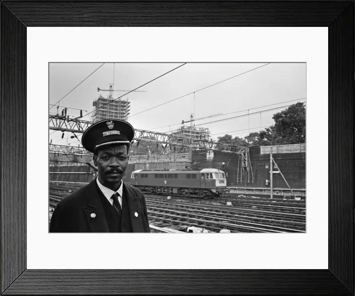 Framed Print : Railway guard seen here at Euston Station. 15th August 1966 Framed Print : Railway guard seen here at Euston Station. 15th August 1966