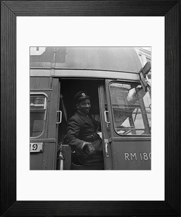 Framed Print : London Transport driver seen here with his Routemaster bus 29th October 1966