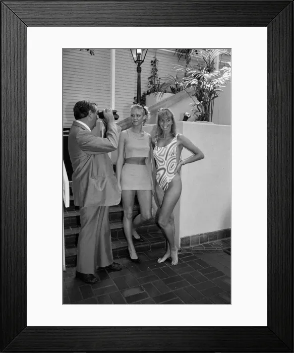 Framed Print : Politician and keen photographer Denis Healey tries out the new Polaroid camera