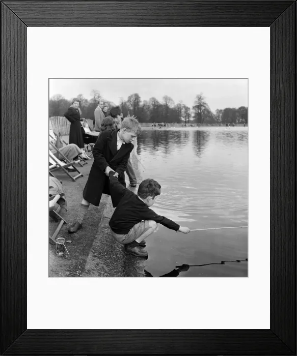 Framed Print : Children fishing in Kensington Gardens pond, London. 25th April 1955 Framed Print : Children fishing in Kensington Gardens pond, London. 25th April 1955
