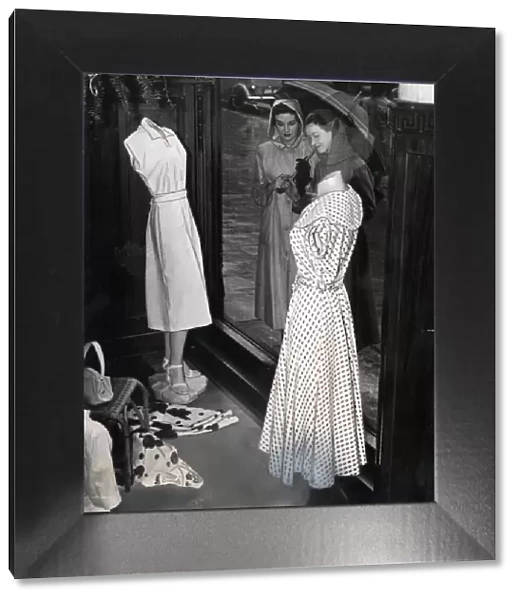 Two young women window shopping in Sauchiehall Street, Glasgow 1951 Photo taken