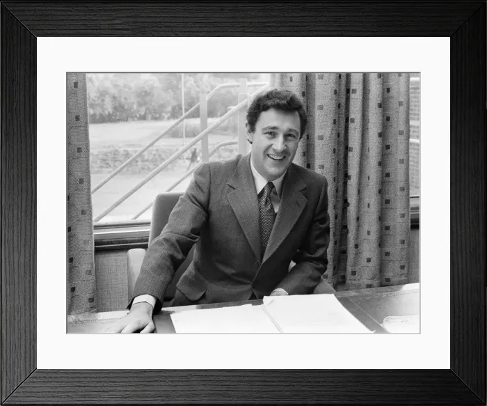 Framed Print : Geoffrey Robinson, Managing Director Jaguar Cars, pictured at his desk, Coventry