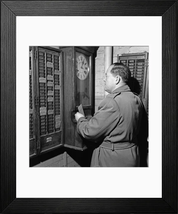 Framed Print : Clocking on at the Daily Herald newspaper offices. 18th December 1959 Framed Print : Clocking on at the Daily Herald newspaper offices. 18th December 1959