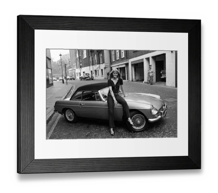 Framed Print : Model Charlotte Anne Curzon, aged 21, bought herself an MGB car
