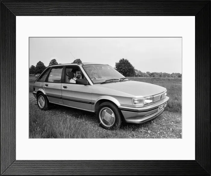 Framed Print : A man and woman in a MG Maestro. 8th June 1983