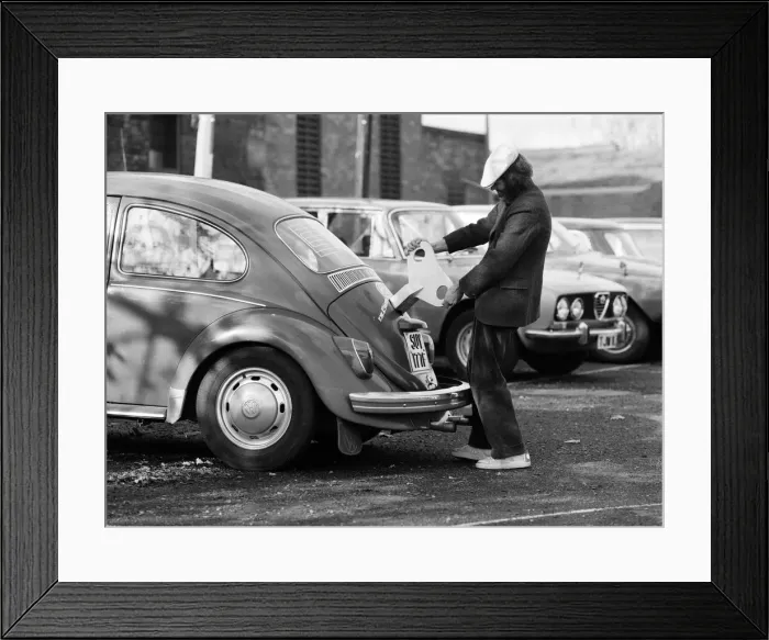 Framed Print : Architectural student Vic Lock, 26, of Kidderminster, winds up his 11-year-old Volkswagen Framed Print : Architectural student Vic Lock, 26, of Kidderminster, winds up his 11-year-old Volkswagen