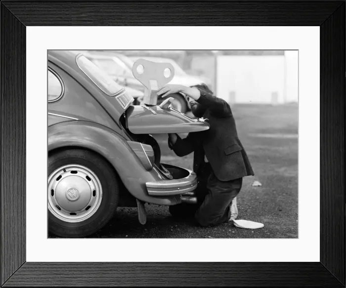 Framed Print : Architectural student Vic Lock, 26, of Kidderminster, winds up his 11-year-old Volkswagen Framed Print : Architectural student Vic Lock, 26, of Kidderminster, winds up his 11-year-old Volkswagen