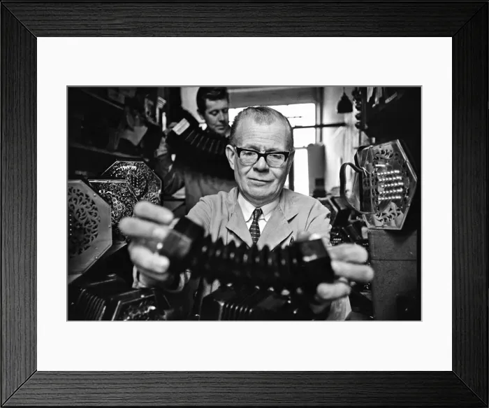 Framed Print : Harry Crabb seen here with his son Neville making concertina Framed Print : Harry Crabb seen here with his son Neville making concertina