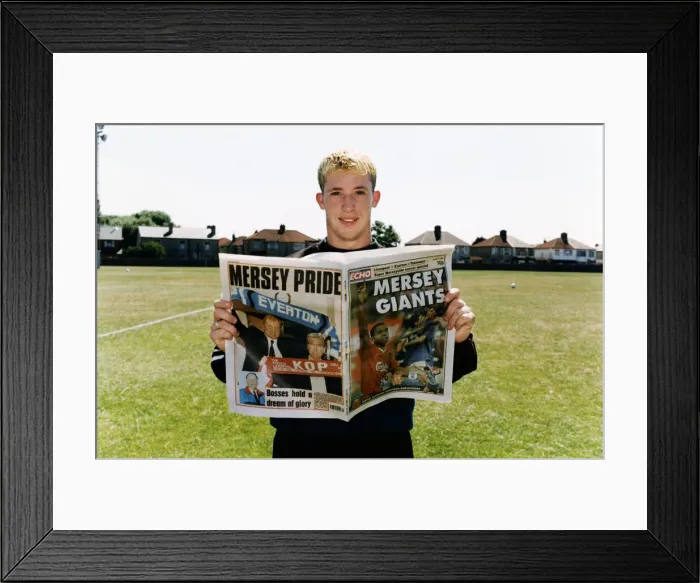 Framed Print : Liverpool striker Robbie Fowler with Mersey Giants Soccer Special. 10th August 1995
