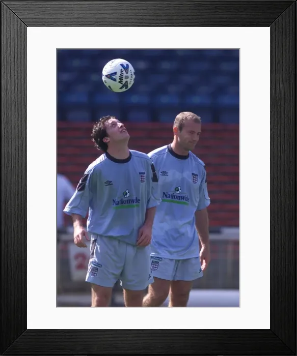 Framed Print : England strikers Robbie Fowler and Alan Shearer pictured during a training session Framed Print : England strikers Robbie Fowler and Alan Shearer pictured during a training session
