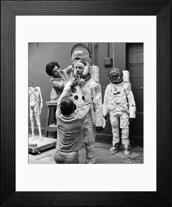 Framed Print : Madame Tussauds staff put the finishing touches to waxwork models of astronauts Neil Framed Print : Madame Tussauds staff put the finishing touches to waxwork models of astronauts Neil
