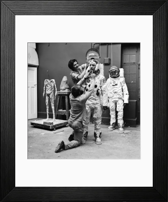 Framed Print : Madame Tussauds staff put the finishing touches to waxwork models of astronauts Neil Framed Print : Madame Tussauds staff put the finishing touches to waxwork models of astronauts Neil