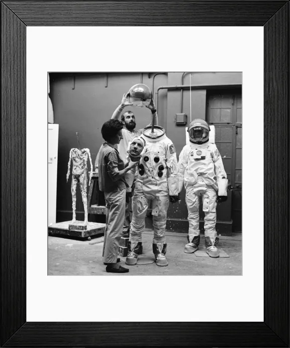 Framed Print : Madame Tussauds staff put the finishing touches to waxwork models of astronauts Neil Framed Print : Madame Tussauds staff put the finishing touches to waxwork models of astronauts Neil