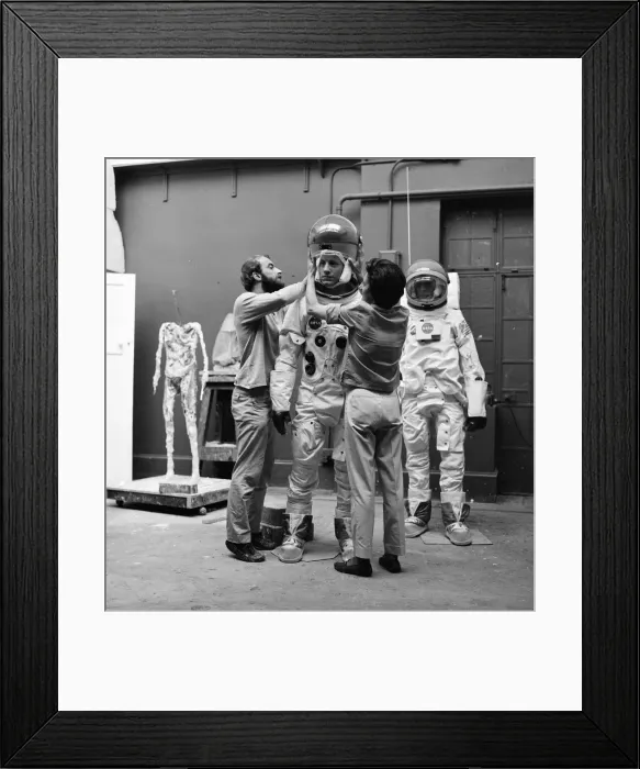 Framed Print : Madame Tussauds staff put the finishing touches to waxwork models of astronauts Neil