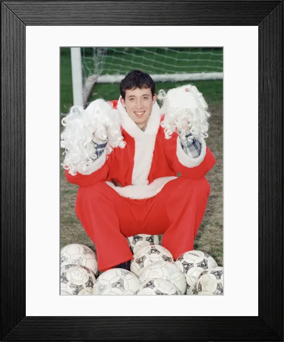 Framed Print : Liverpool striker Robbie Fowler dressed as Farther Christmas. 19th December 1995 Framed Print : Liverpool striker Robbie Fowler dressed as Farther Christmas. 19th December 1995