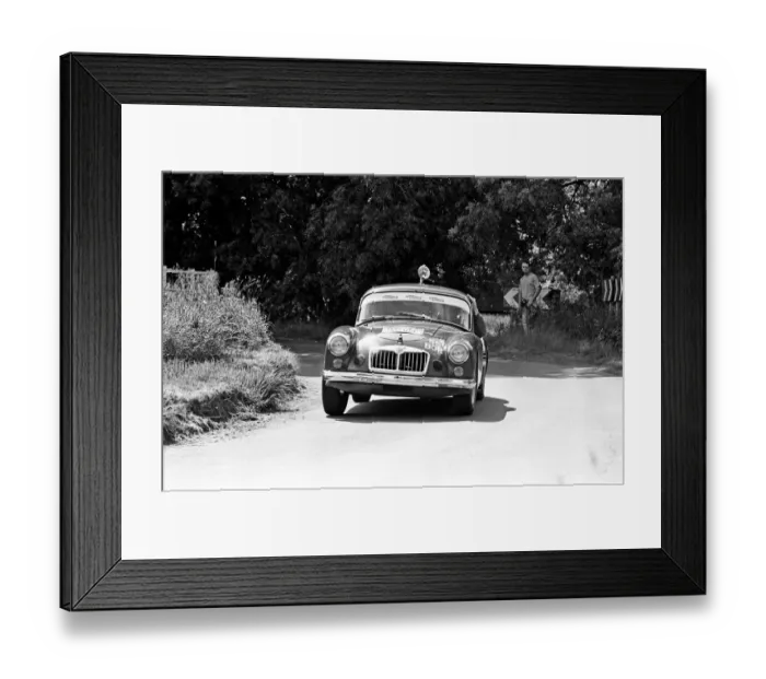Framed Print : Bryan Halladay from Warwick in a bright red 1962 MGA which he will be driving in Framed Print : Bryan Halladay from Warwick in a bright red 1962 MGA which he will be driving in
