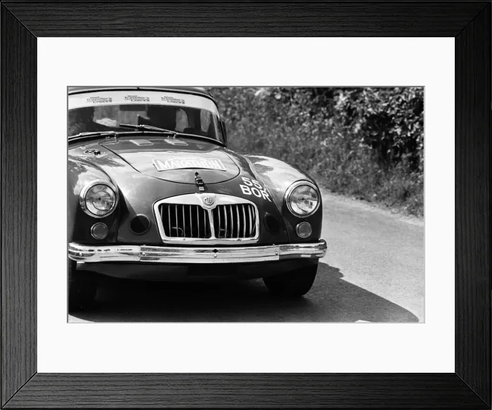 Framed Print : Bryan Halladay from Warwick in a bright red 1962 MGA which he will be driving in Framed Print : Bryan Halladay from Warwick in a bright red 1962 MGA which he will be driving in