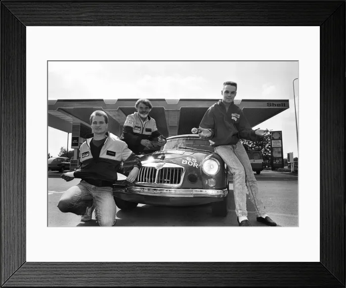 Framed Print : Bryan Halladay from Warwick with a bright red 1962 MGA which he will be driving in Framed Print : Bryan Halladay from Warwick with a bright red 1962 MGA which he will be driving in