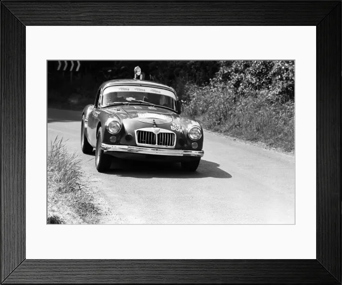 Framed Print : Bryan Halladay from Warwick in a bright red 1962 MGA which he will be driving in Framed Print : Bryan Halladay from Warwick in a bright red 1962 MGA which he will be driving in