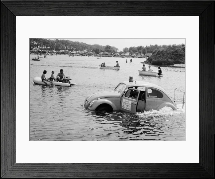 Framed Print : Malcolm Buchanan and Bill Helmeage who have spent the last month making a VW watertight