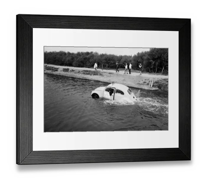 Framed Print : Malcolm Buchanan and Bill Helmeage who have spent the last month making a VW watertight