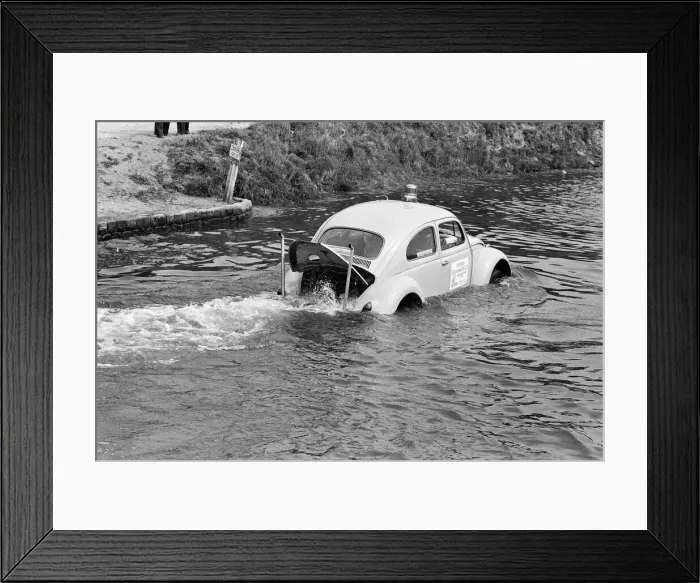Framed Print : Malcolm Buchanan and Bill Helmeage who have spent the last month making a VW watertight