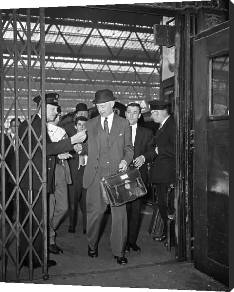 Lord Denning, Minister of the Rolls arrives at Waterloo Station to present his report