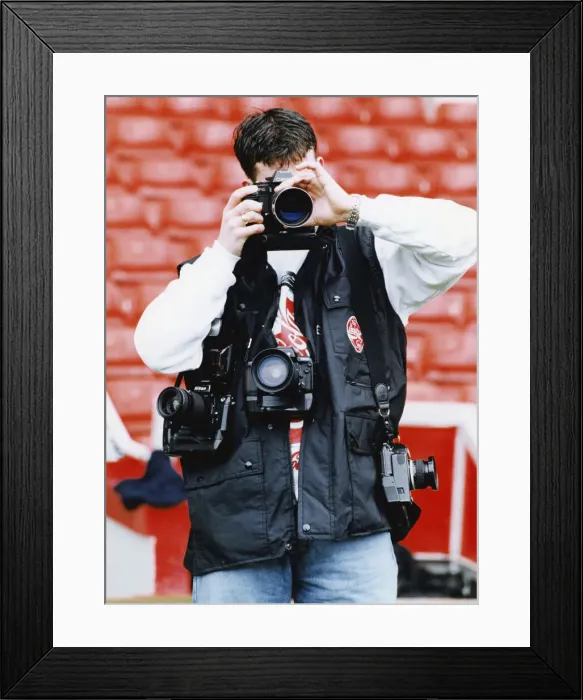 Framed Print : Liverpool striker Robbie Fowler has Wembley in his sights as he tries his hand behind Framed Print : Liverpool striker Robbie Fowler has Wembley in his sights as he tries his hand behind