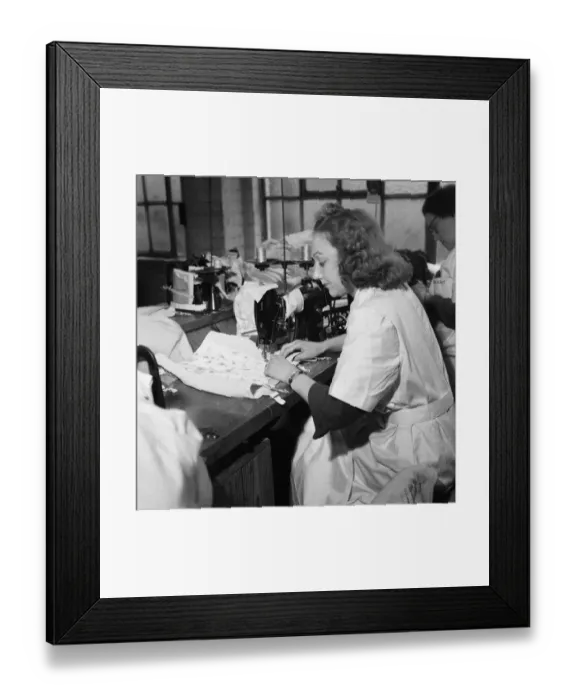 Framed Print : Au Fait girdle being sewn at the Spirella Corset factory in Letchworth 14th January 1949
