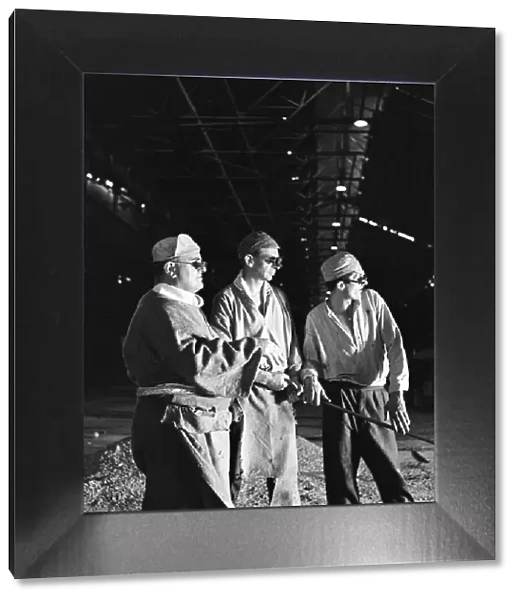 Three of the operators of one of the open hearth furnaces at the Stocksbridge Steelworks