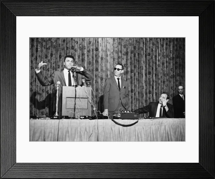 Framed Print : Muhammad Al in a press conference leading up to his bout with Ernie Terrell Framed Print : Muhammad Al in a press conference leading up to his bout with Ernie Terrell